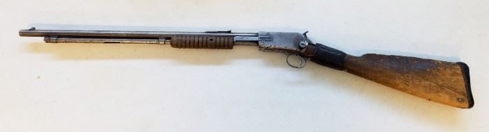 Condition of rifle is rough, particularly the stock which is very worn, cracked, and mended with tape. Serial #571477B dating the rifle to 1920.