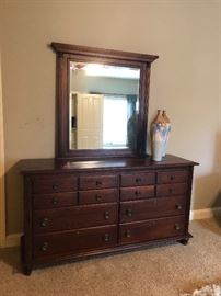 mirrored dresser with large decorative vase (I should be reflected but you can't see me because I'm of the vampire persuasion)