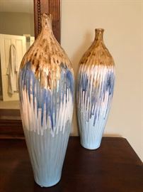 Lovely ceramic urn-type vessels straight from the arms of creekside Renaissance waifs