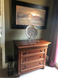 painting of nude laying languidly facing away from artist. Or maybe murder victim. You decide. Also, dresser.