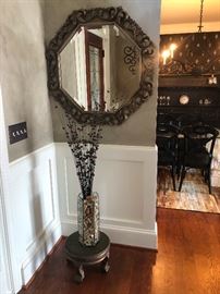 Lots of large decorative wall mirrors -- you will never leave the house without looking into one