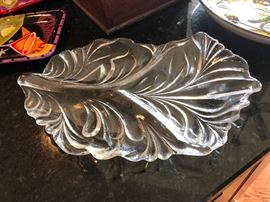 Impress you guests by serving them canapes from a big  silver leaf shaped plate