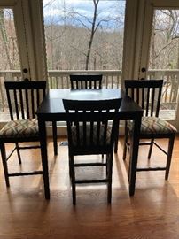 Bistro table with leaves and four gorgeous high-top chairs (there are two of these sets at this sale)