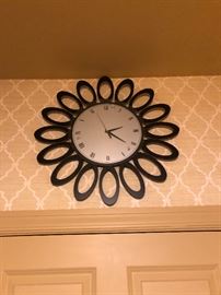 Lots of pretty wall clocks. You will never be late again!