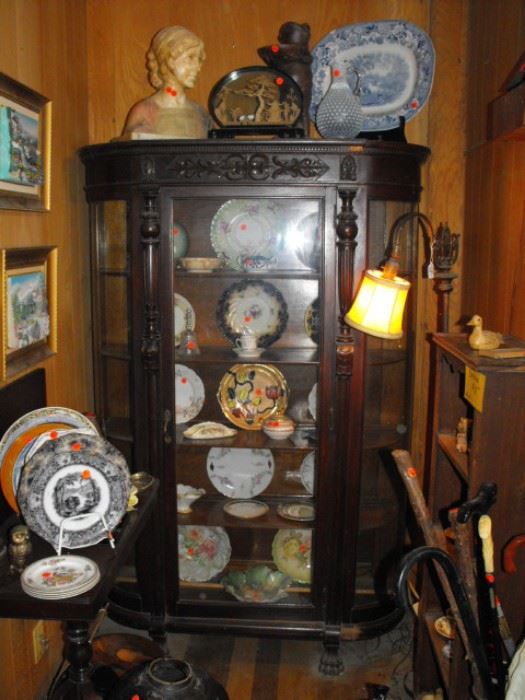 beautiful antique cabinet with curved side glass and lion feet