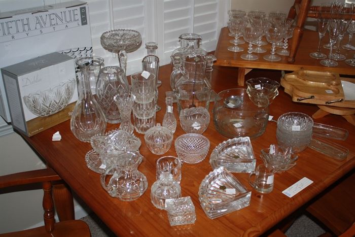 Very nice crystal and glass items, on top of the really good dining room table.  The table is quality.  