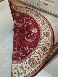 large, round area rug (partial picture)