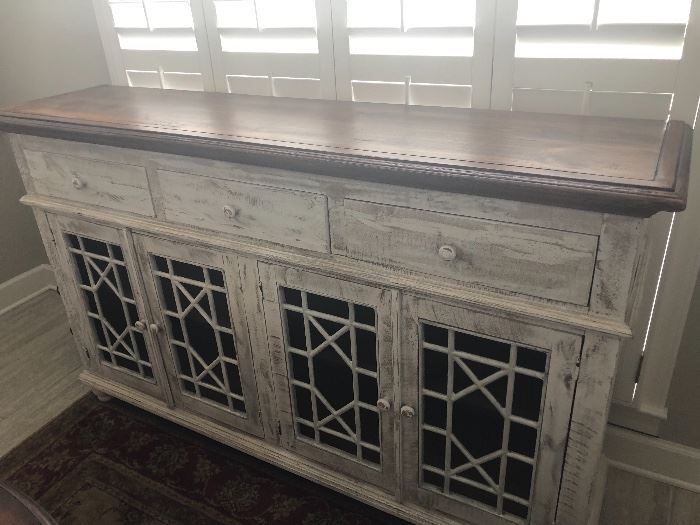One of three faux finish vintage style servers. Great storage. Old world look. Sturdy and well made. As you will see in the photos, a great accent piece for any room in your home.