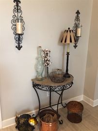A collection of unusual and unique- cat fan. Small iron and marble table. Copper bucket with original tags. Glass bottle with cork. Pair of iron wall sconces and more
