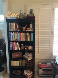 One of three bookshelves for sale . This one holds a great selection of cookbooks