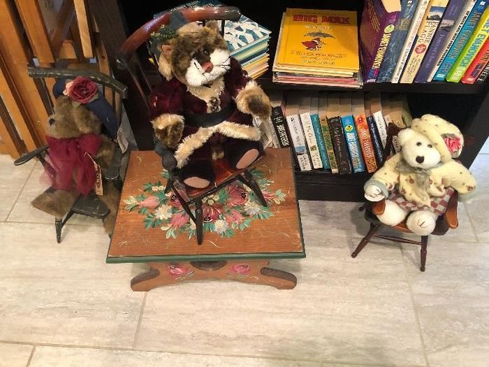 Cute bears sitting in cute miniature chairs