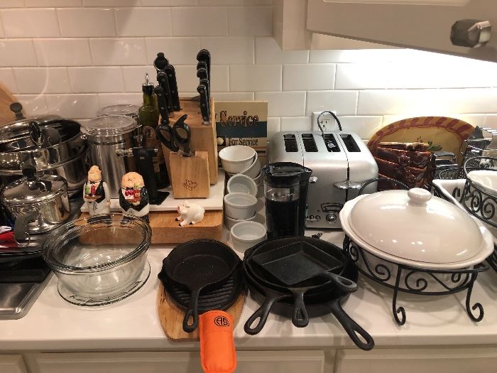 Cast iron pans in great condtion with a very nice knife set and a super stainless toaster