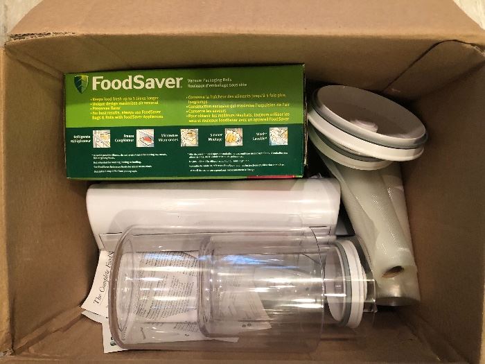 All in the box and ready to go home. A food saver machine ready to put up the vegetables or the great buys at the grocery. Buy now and freeze and enjoy your savings all year long