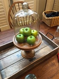 Glass dome on a wooden pedestal