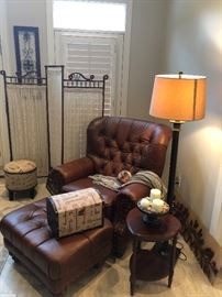 An inviting corner. Metal floor lamp. Mahogany side table. Ball and stick antique dressing screen.