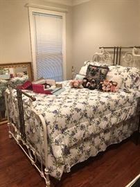 Vintage and sturdy. Very nice ornate cast iron bed