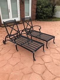 a pair of outdoor loungers. big and roomy. we have the like new cushions too