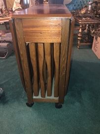 Vintage Hide away table with 4 chairs. 