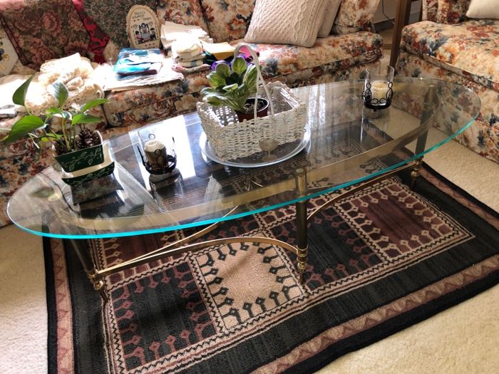 Oval glass/brass coffee table