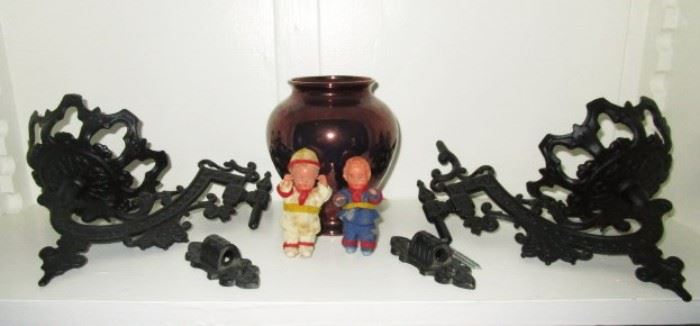 Cast iron brackets for kerosene lamps, vase, small celluloid dolls