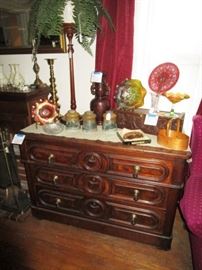 Beautiful 3 drawer antique dresser, carnival glass, hand painted lamp globes, antique plant stand, brass candle sticks, etc.