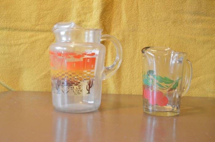 Two tea pitchers glass  cute design