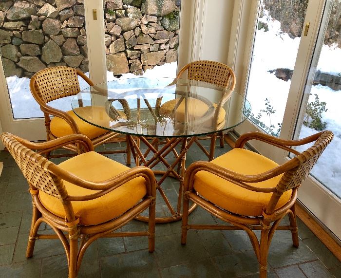 Fabulous Vintage McGuire Bamboo and Rattan Patio Set feat. glass top table, and 4 chairs.