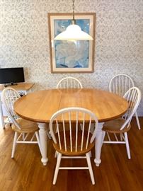 Simple kitchen table with 5 chairs - feat. additional leave.