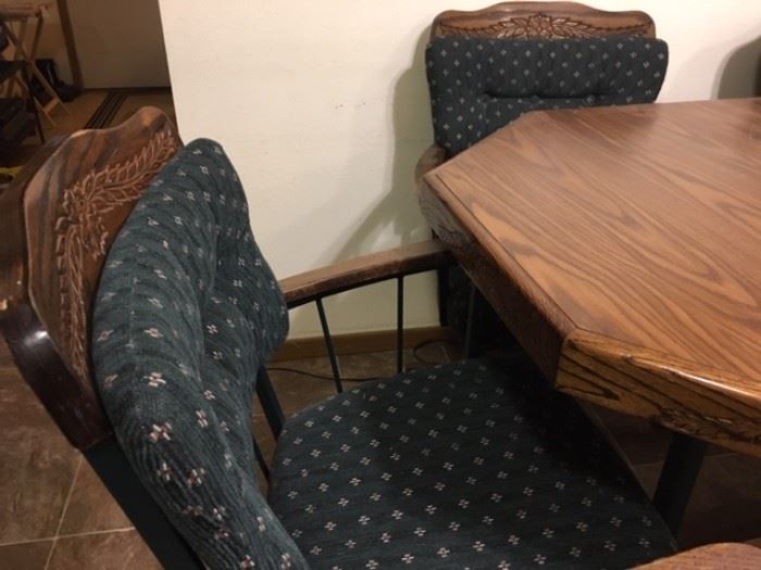 Octagonal table plus 4 rocker/rolling chairs plus large leaf
