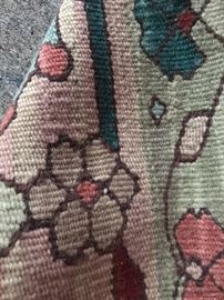 BACK OF RUG IN LIVING ROOM 