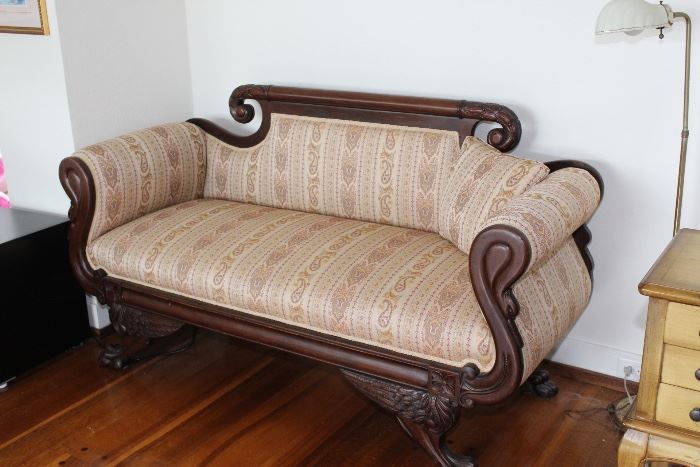 Wood trimmed sofa originally from Flanders Hotel