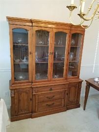 What a dish cabinet  priced to go fast.. its a medium size so it won't take up your whole dining area