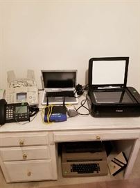 and the matching desk with a Dell Laptop/XP may need a battery but works plugged in. The desk matches that previous white cabinet