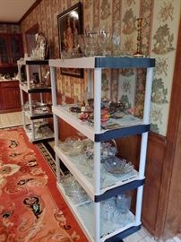 Many shelves of glassware Crystal and silver are left