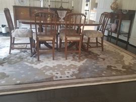 Sack dining set, Rug by Edward Fields 