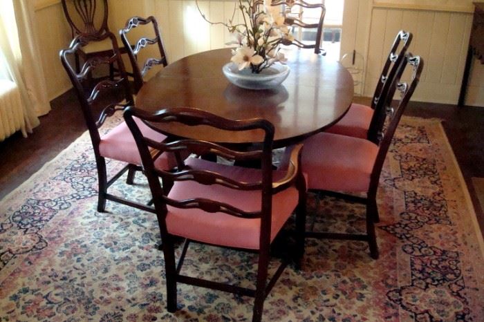 Duncan Phyfe extension dining table and six Chippendale style chairs.