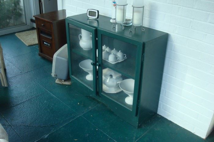 Small bookcase with Crate & Barrel ironstone china.