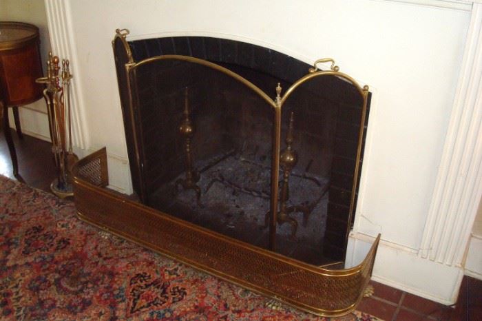 Brass fireplace items.