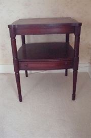 One of a pair vintage mahogany side tables.
