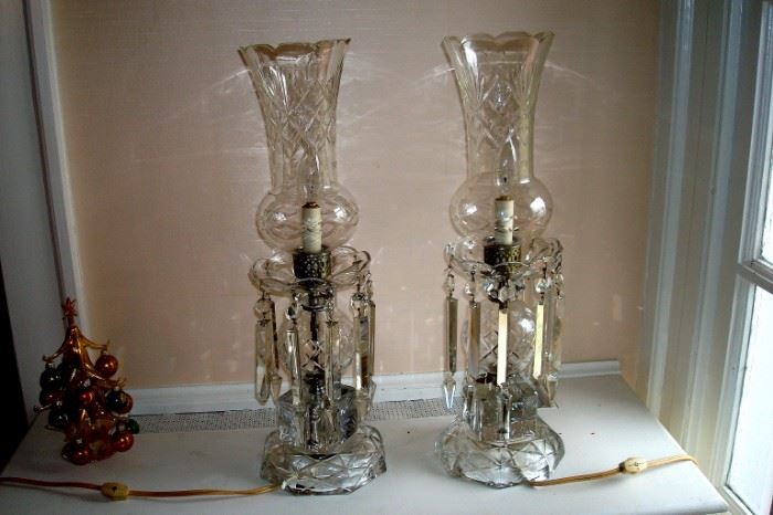 One of a pair ornate cut glass crystal lamps.