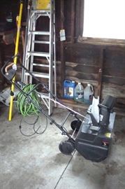Electric snow thrower, good working with cord. ladder and misc.