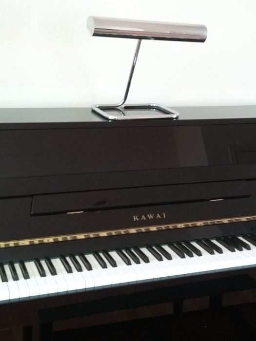 Sleek black lacquer Kawai Piano