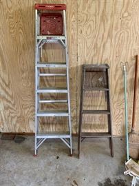Ladders and household cleaning items.