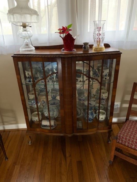 Antique hutch with mirrored back.