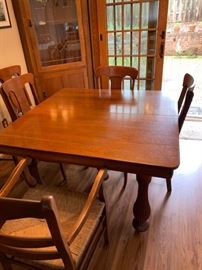 Antique dining table.  Table comes with 4 leaves, stretching it from 4 seats to 12 seats.