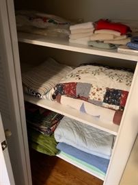 Linens and handmade quilts.