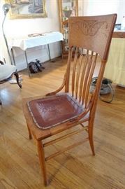 Set of four antique chairs with pressed leather seats