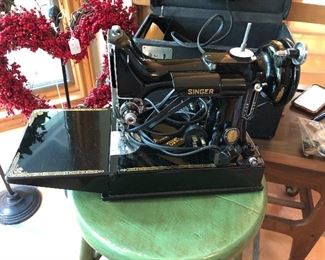Miniature Singer sewing machine in case with all attachments and manual