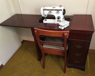Dressmaker Sewing Machine Fold Out Table Complete w/ Foot Pedal. Sewing Chair w/ Extra storage drawer. 