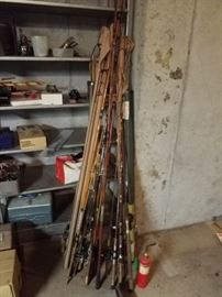 Antique fishing poles,  lures and others